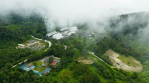Aerial view of geothermal power production plant. Geothermal power station near to the active volcano Apo. Mindanao, Philippines